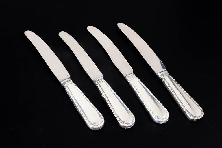 Georg Jensen, Denmark. Set of four knives in stainless steel and silver. Approx. 1915â€ (1 of 5)