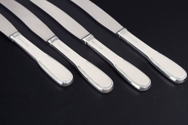 Evald Nielsen, Denmark. Lunch knives, set of four in sterling silver and stainless steel. Approx. - 3