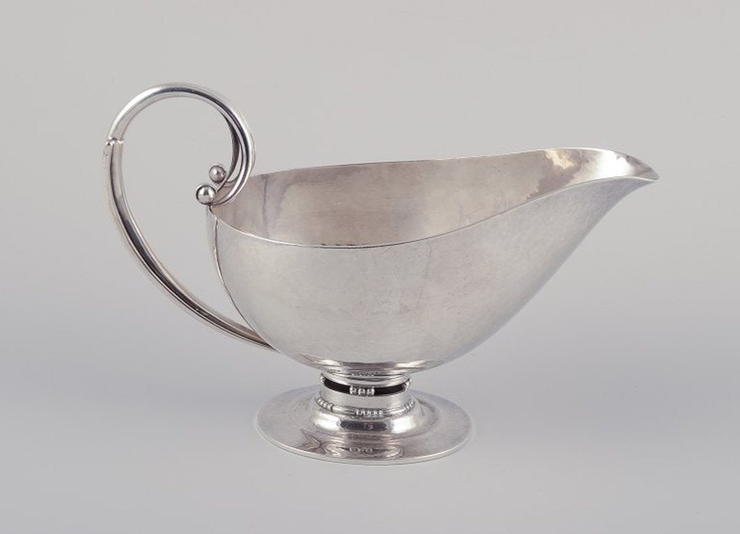 Johan Rohde for Georg Jensen, Denmark. Sterling silver gravy boat. Hand hammered pitcher with handle (1 of 5)
