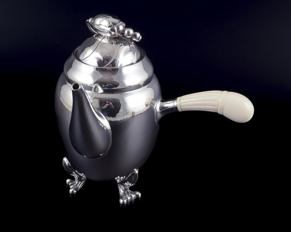 Georg Jensen Blossom. Coffee pot in hand hammered sterling silver with bone handle. 1933-1944. (1 of 5)