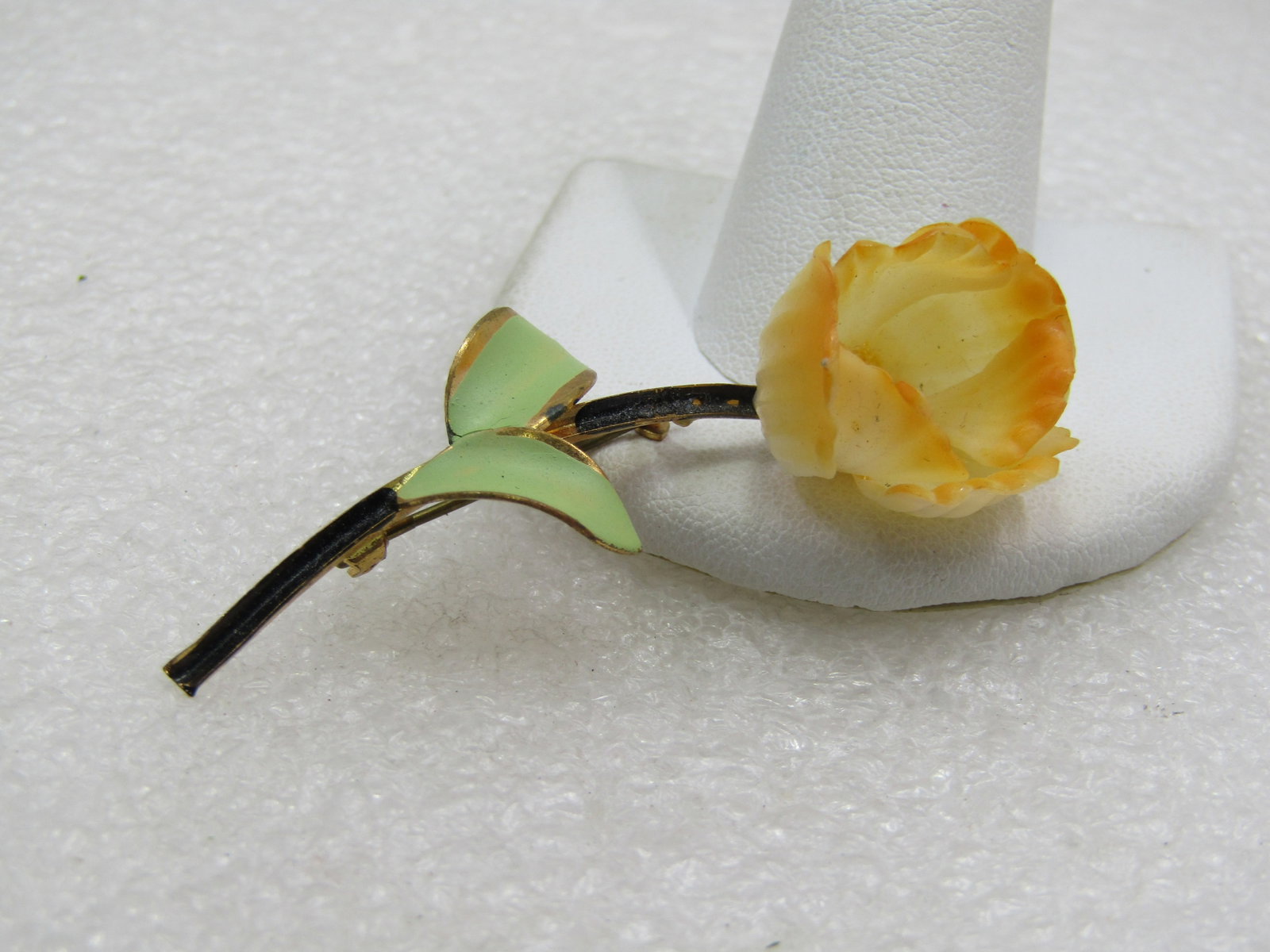 Vintage Pale Orange Floral Enameled Brooch, 1940's-1950's: Vintage Pale Orange Floral Enameled Brooch, C-clasp. 1940's-1950's 2-1/8". This has a 3-D blossom that is white at the center and then becomes a pale cream to yellow with light orange tips. The blosso