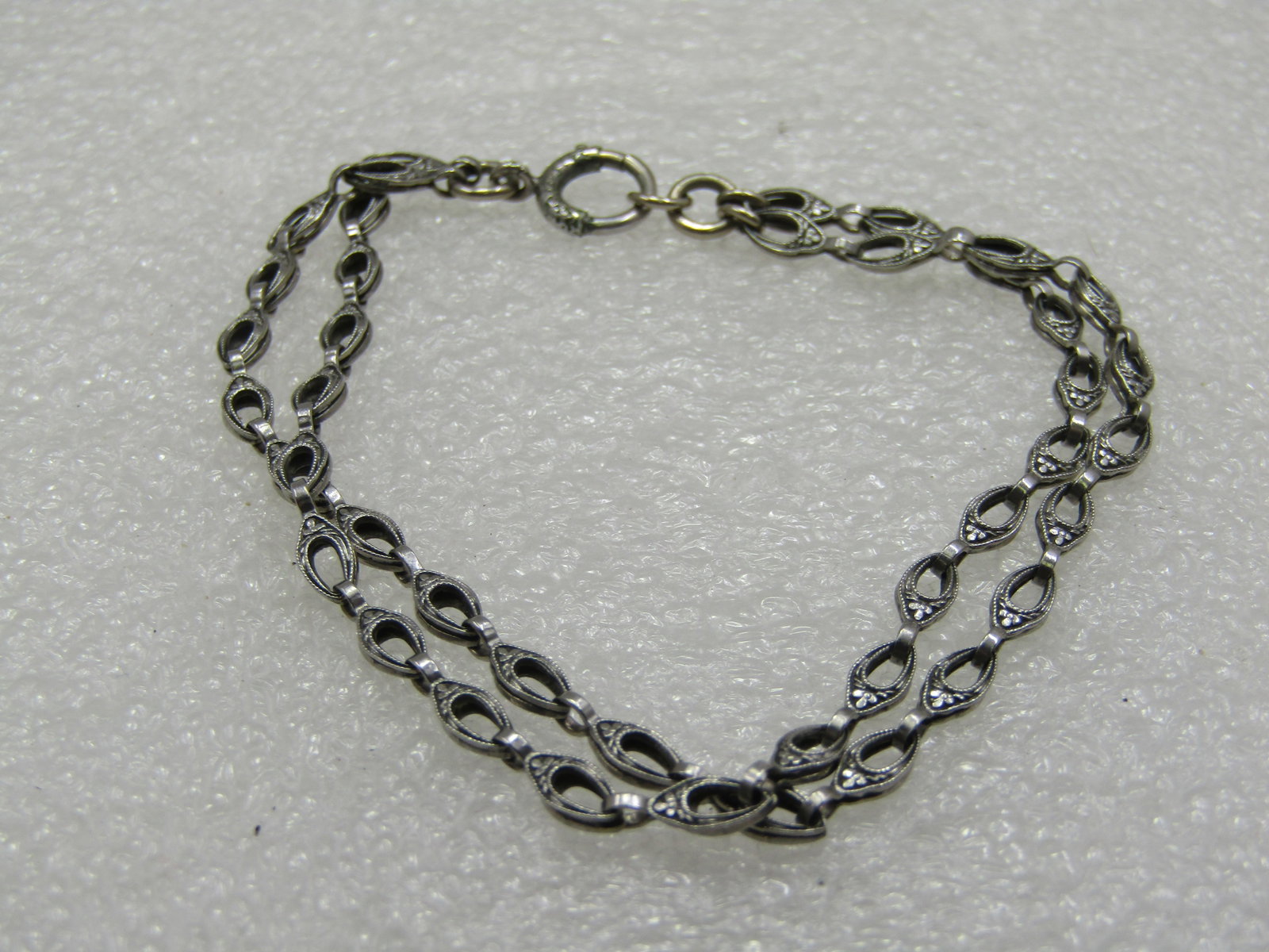 Vintage Silver Double Strand Bracelet, 7.25", MId-Century: Vintage Silver Double Strand Bracelet, 7.25", MId-Century. This tests as silver - could be .800 or higher but may not be .925. Weight is papx. 6.41 grams. It has 3mm wide double strand of a textured