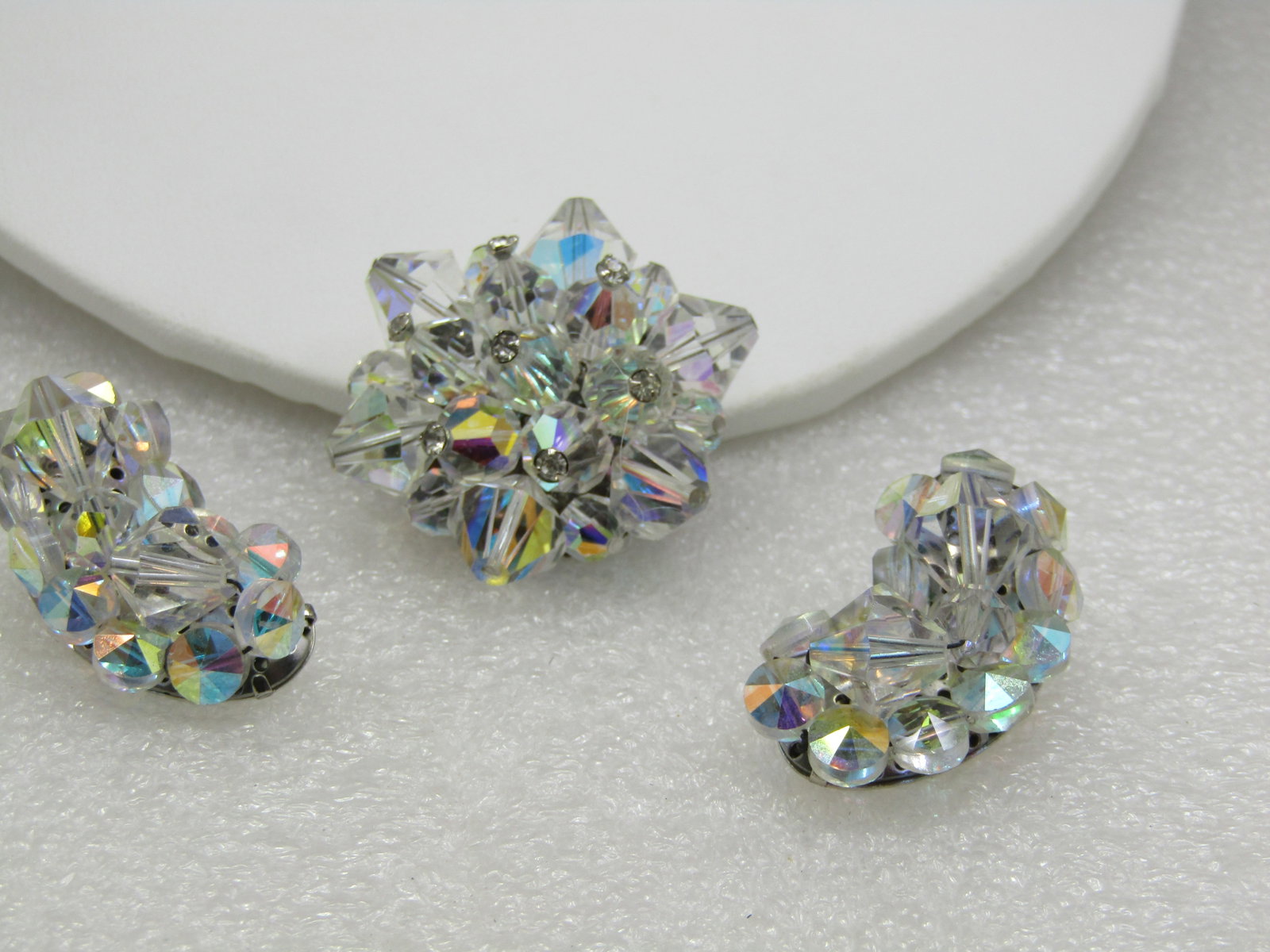 Vintage Crystal Aurora Borealis Brooch and Earrings, Mid-Century: Vintage Crystal Aurora Borealis Brooch & Earrings, Mid-Century. The brooch is appx. 1.5" across with the crystal beads pointed outward like a starburst. The earrings are clip and slightly curved, 1.25