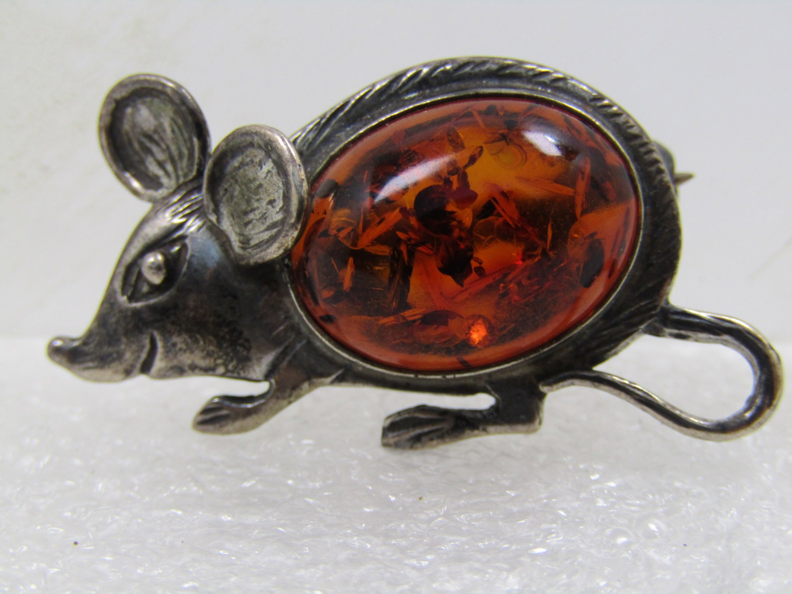Vintage Sterling Amber Mouse Brooch, Post Mid-Century: Vintage Sterling Amber Mouse Brooch, Post Mid-Century, appx. 1970's. The mouse has a body that is made with an oval amber cabochon. The amber does test positive with the static test. The amber has