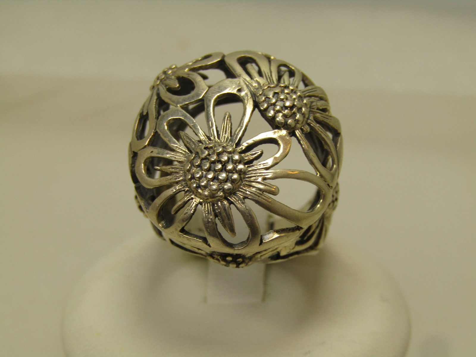 Vintage Sterling Silver Wide Floral Ring, Sz. 6, 1980's-1990's: Vintage Sterling Silver Wide Floral Ring, Sz. 6, 1970's. This is a statemetn ring for the flower lover. Open work daisy-like design with the top being 24.5mm by 22.5mm with three daisy type flowers on