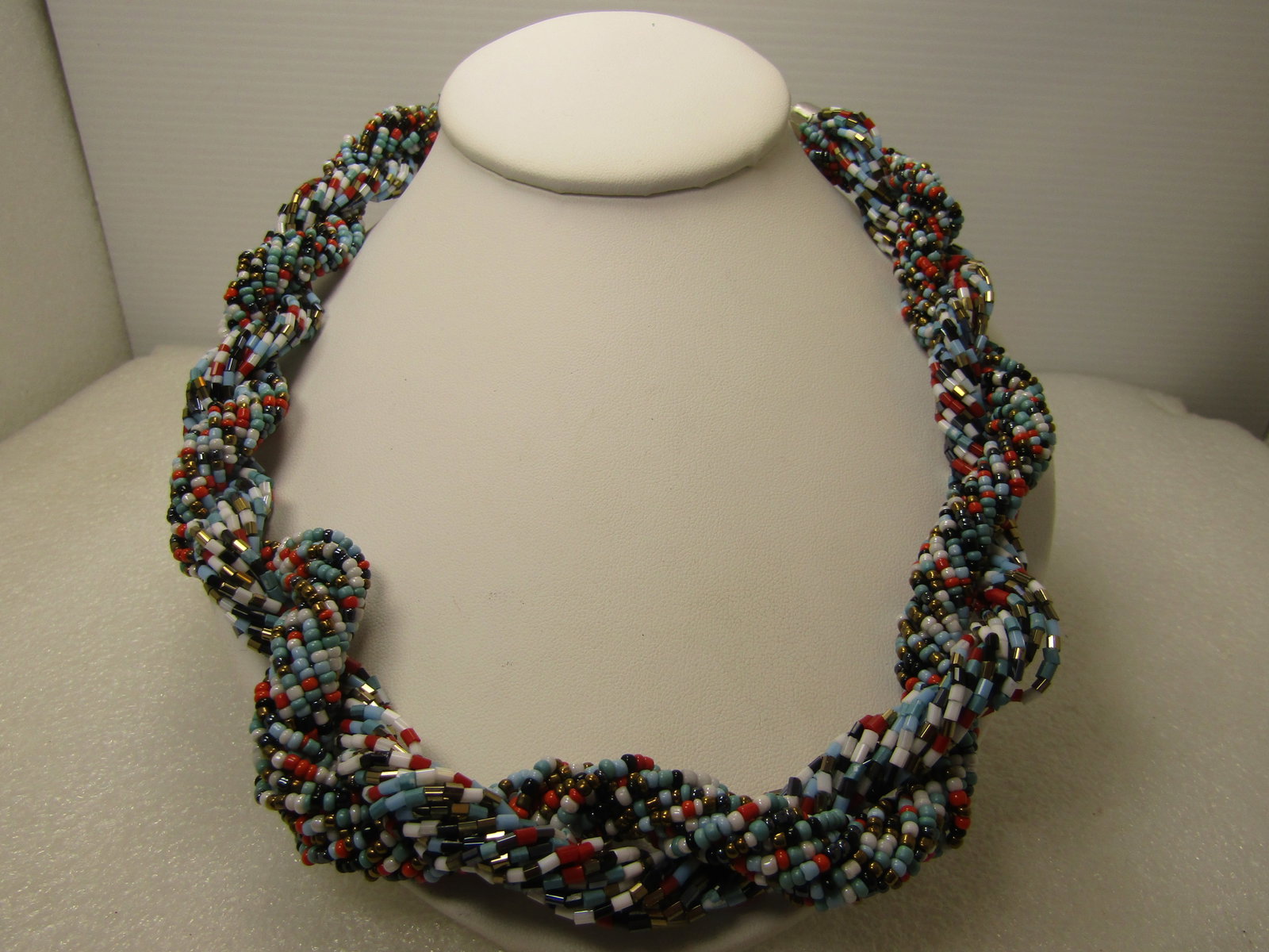 Multi-Strand Twisted Seed Bead Necklace, 23", Signed CG, 1990's, Southwestern Vibe: Multi-Strand Twisted Seed Bead Necklace, 23", Signed CG, 1990's. Multi-strand of glass round seed beads in turquoise blue orange, white, black and then a slightly thinned twisted multi-strand in the
