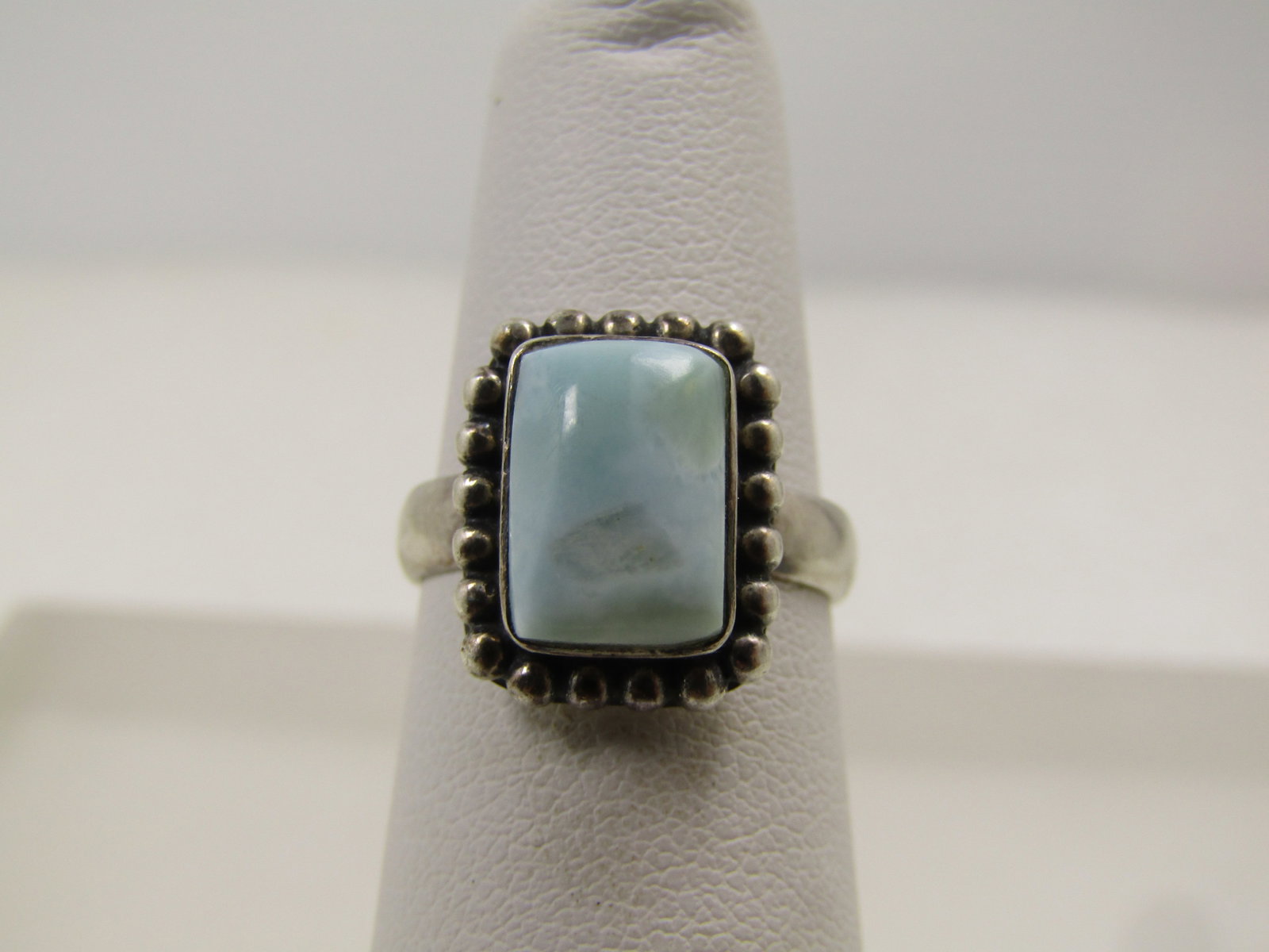 Vintage Sterling Lariamr Ring, Sz. 5, Southwestern , 1980's-1990's: Vintage Sterling Lariamr Ring, Sz. 5, Southwestern , 1980's-1990's. The rectangular pale blue stone is believed to be larimar. It does have a little rub mark or lighter area that was polished over.