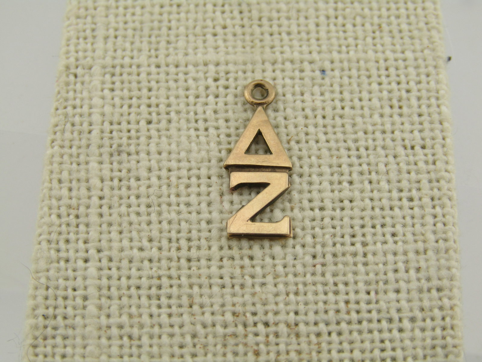 Vintage 10k Delta Zeta Sorority Pendant Signed, Mid-Century: Vintage 10k Delta Zeta Sorority Pendant Signed, Mid-Century, This is signed but I cannot read the name. It is marked 10kt and tests as 10kt with a weight of appx. .35 grams. It is appx. 3/4" tall and
