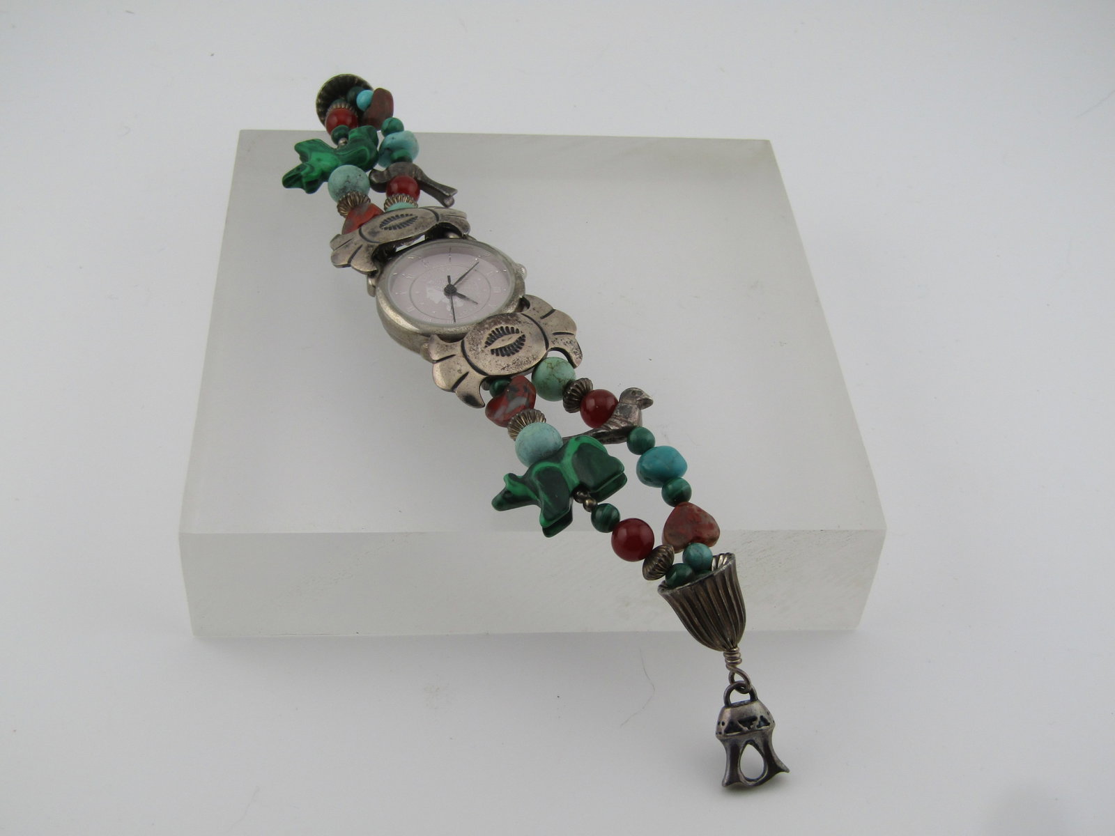 Sterling Carolyn Pollack Southwestern Watch, Malachite, Tuquoise, 7.5" 1990's: Sterling Carolyn Pollack Southwestern Watch, Malachite, Tuquoise, 7.5" 1990's. This has a Liberty watch with second hand - it does need a battery. Silver tone. It has silver decorative 1" wide bow-lik