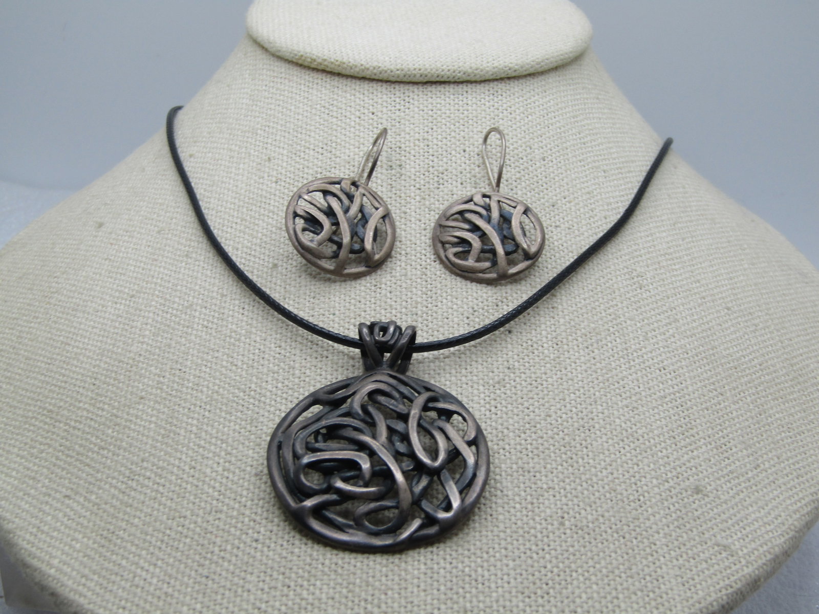 Vintage Sterling Silpada Pendant and Earrings, Set, 17"-19", 1990's: Vintage Sterling Silpada Pendant and Earrings, Set, 17"-19", 1990's. The pendant has a wide bail aand is appx. 1.75" long and 1.25" wide. It is marked .925 and signed Silpada. Weight of the pendant is