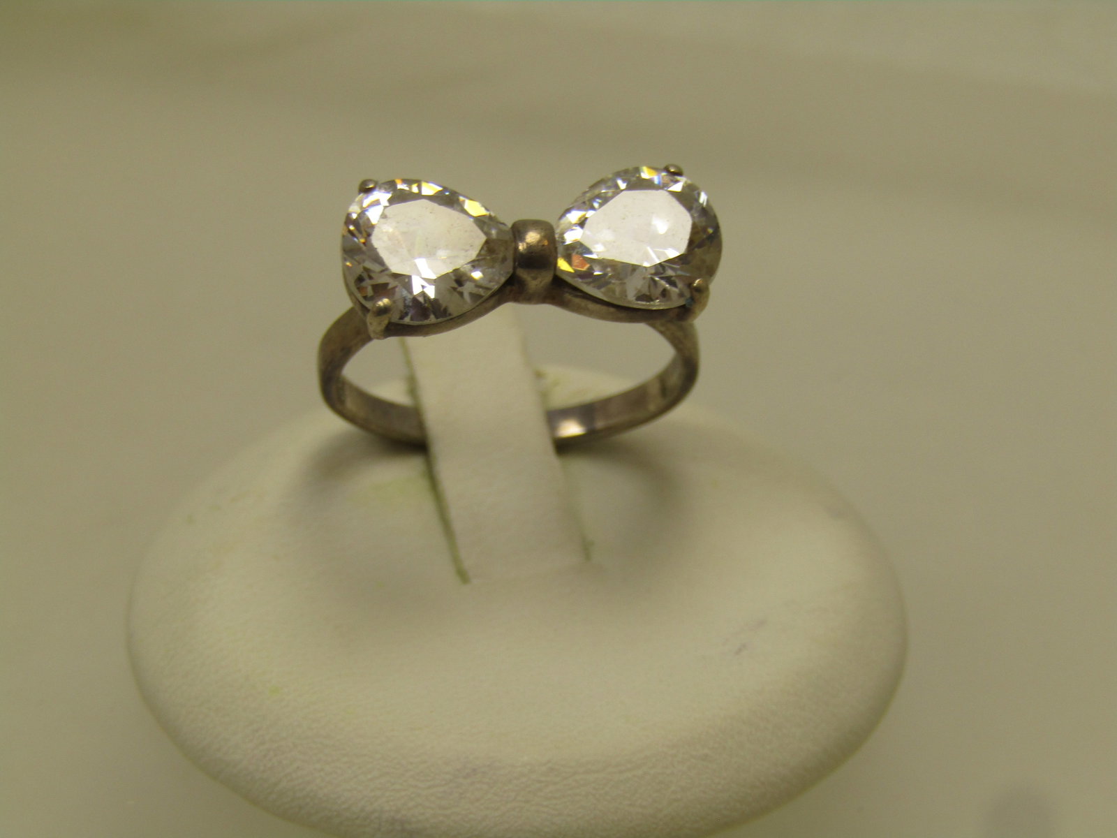 Vintage Sterling Clear Stone Bow Ring, Sz. 7, 1970's-1980's, Signed: Vintage Sterling Clear Stone Bow Ring, Sz. 7, 1970's-1980's, Signed Bee. This has a sterlingaccent between the two stones at center which creates the middle of the bow with two rounded pear-shaped
