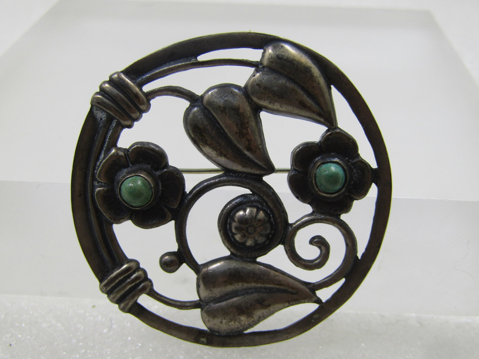 Vintage Sterling Mexican Floral Brooch, Green Stones, C-Clasp, 1930's-1940's: Vintage Sterling Mexican Floral Brooch, Green Stones, C-Clasp, 1930's-1940's. This is the estimated age, could be older, do not believe it is newer. This is appx. 2" with open work with leaves