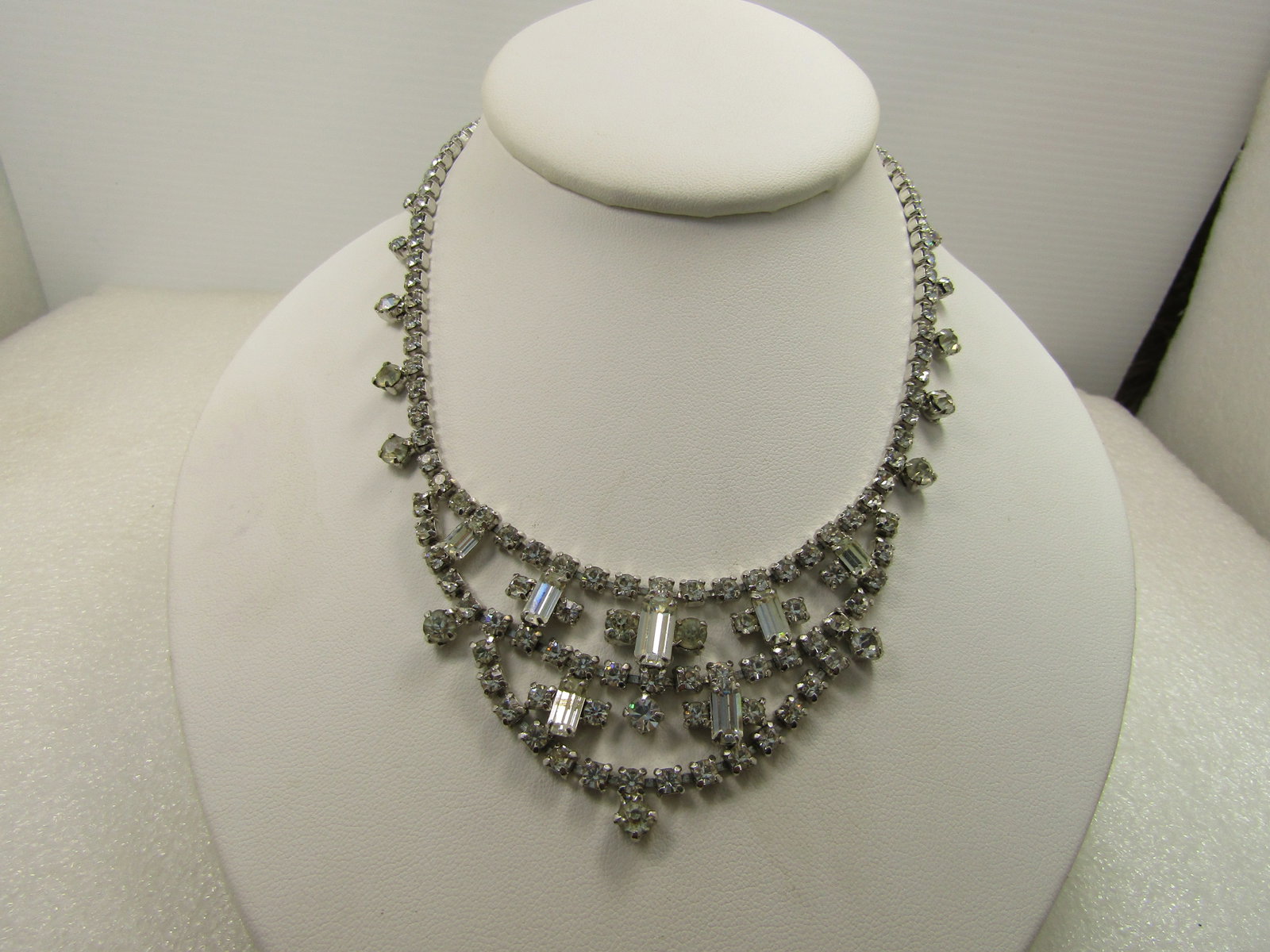 Vintage Clear Rhinestone Drop Bib Necklace, 15.5", Baguettes/Round, 1960's: Vintage Clear Rhinsetone Drop Bib Necklace, 15.5", Baguettes/Round, 1960's. The stones are clear glass. Silver tone with a long strand of clear 3mm round rhinestones set in closed square setting with 