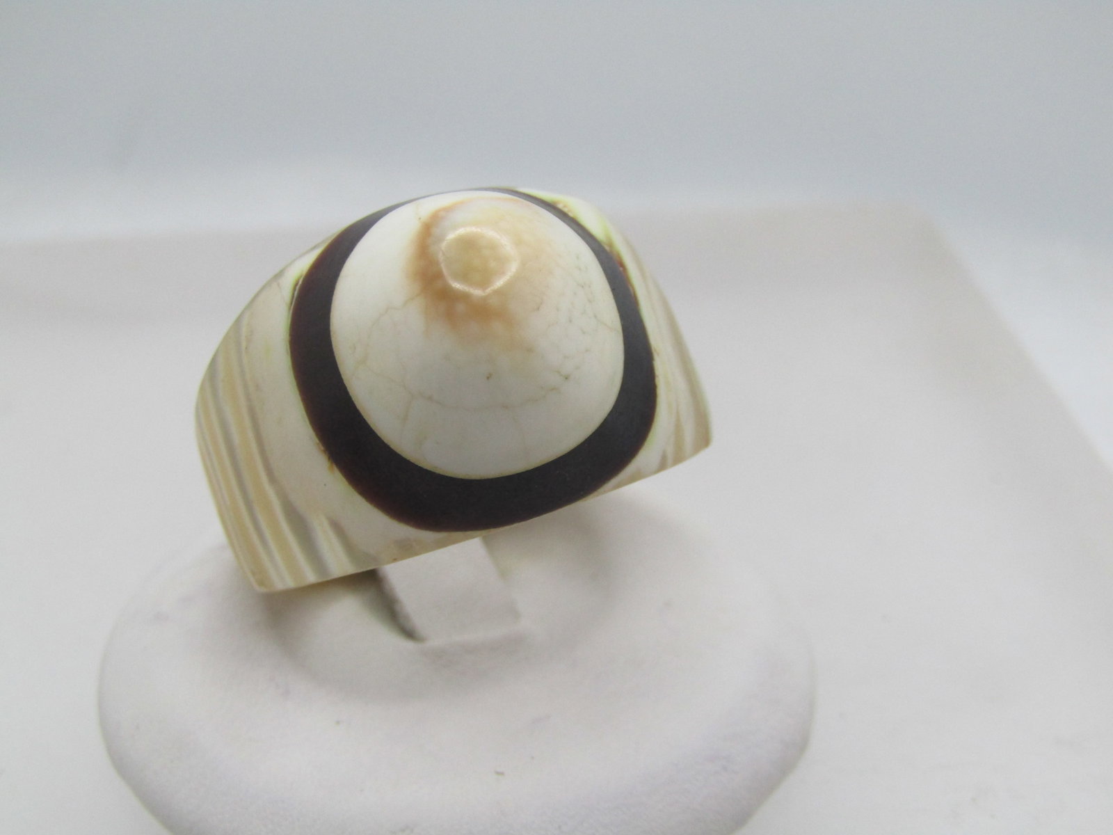 Vintage Carved Shell Ring, Sz. 10, Highly Domed, 1970's: Vintage Carved Shell Ring, Sz. 10, Highly Domed, 1970's Unisex ring - carved from a shell - fits a size 10, The band is notexactly shaped the size all the way around due to the shell shape. It has a