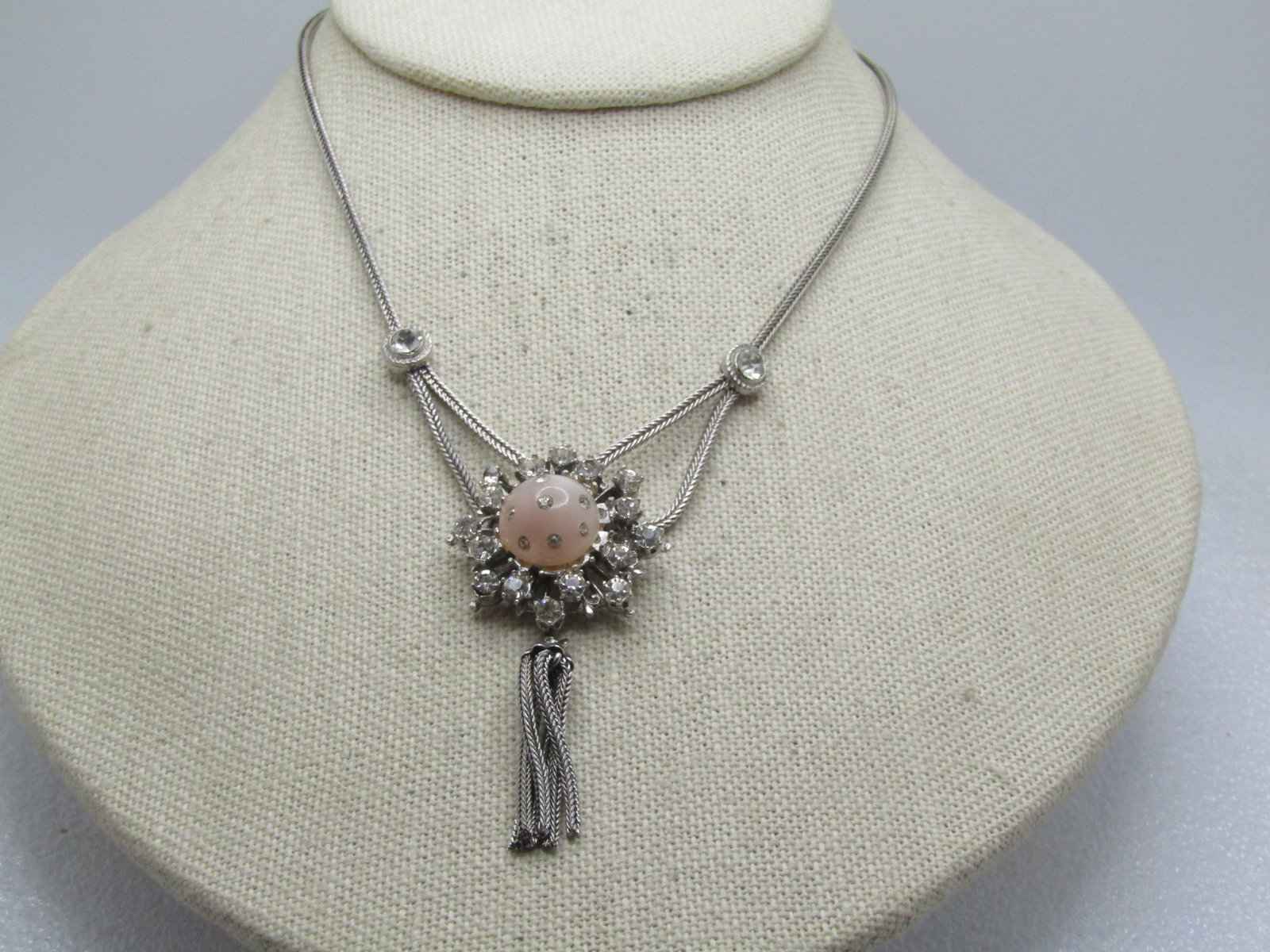 Vintage Rhinestone Lavalier Tassel Necklace, 14.5", Foxtail Link, 1960's: Vintage Rhinestone Lavalier Tassel Necklace, 14.5", Foxtail Link, 1960's. Silver tone appx. 1.7 mm foxtail link chain with flip clasp. Appx. 1.25" up each side there is a bezel-set clear 4mm rhineston