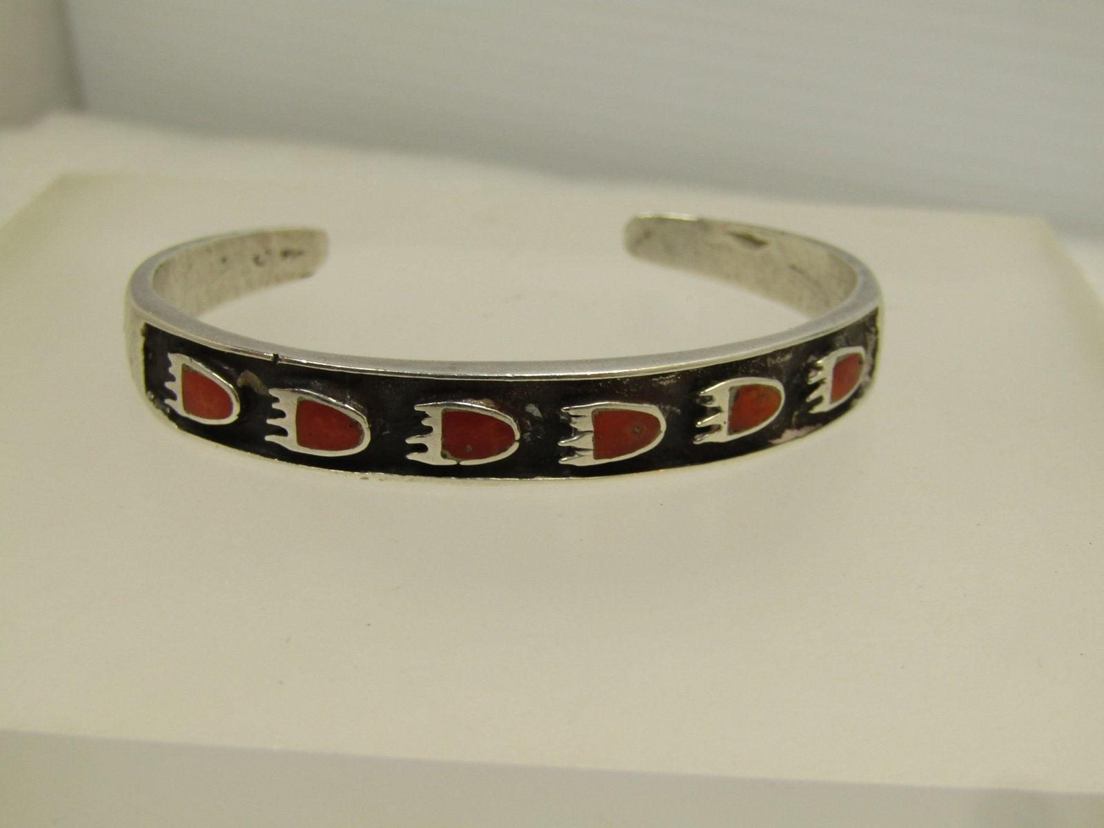 Vintage Southwestern Sterling Coral Bear Paw Bracelet, Cuff, 6.25", 1970's-1980's: Vintage Southwestern Sterling Coral Bear Paw Bracelet, Cuff, 6.25", 1970's-1980's. This is appx. 8.3mm wide at top center and tapers to appx. 4.5mm at the back. It has a 1.25" opening at the backThe