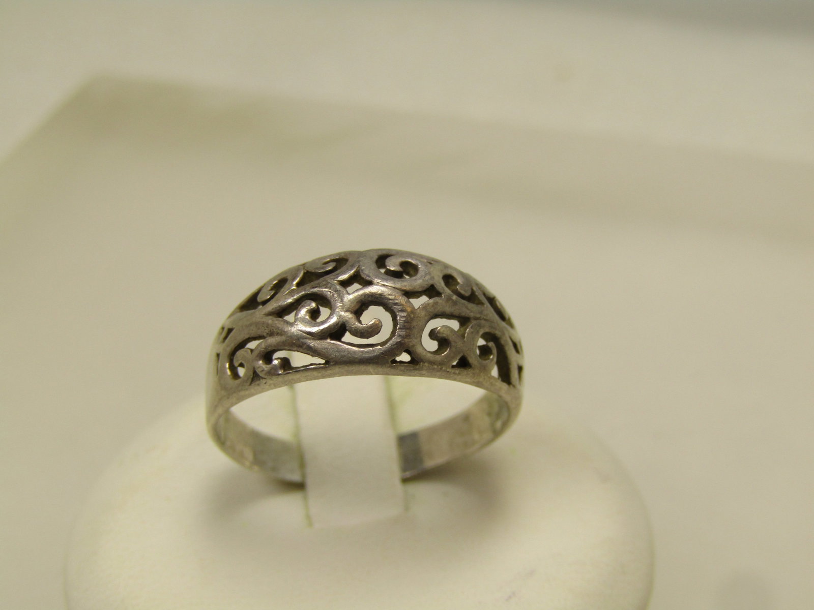 Vintage Sterling Open Domed Scroll Ring, Sz. 9. 1960's-1970's: Vintage Sterling Open Domed Scroll Ring, Sz. 9. 1960's-1970's. This is wider on top and more narrow as it goes around the finger. It is appx. 8.5mm at top center and tapers to 3.5mm at the back of