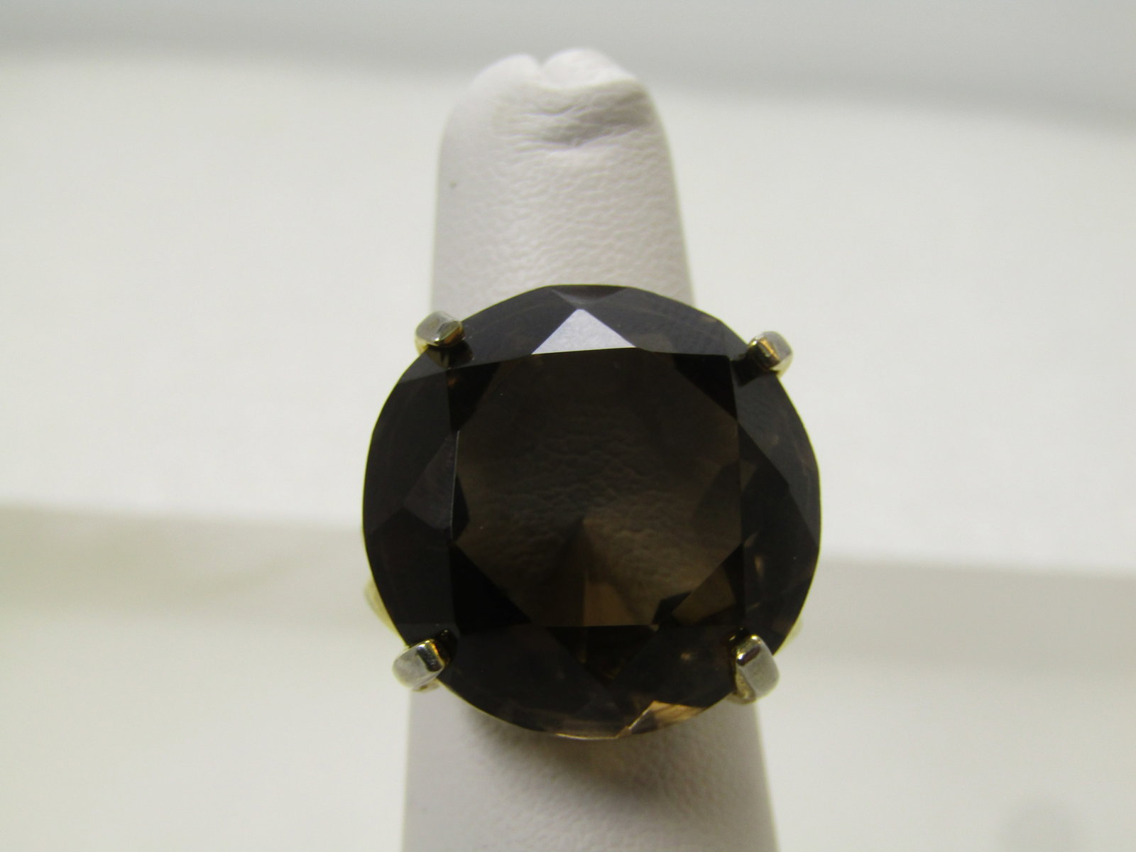 Vintage Brown Smoky Quartz Ring, Adjustable, 1980's: Vintage Brown Smoky Quartz Ring, Adjustable, 1980's. This is a gold tone ring that adjusts from sz. 6 to 9, easily. It can go slightly above and below. The stone is a round stone that is appx. 20mm