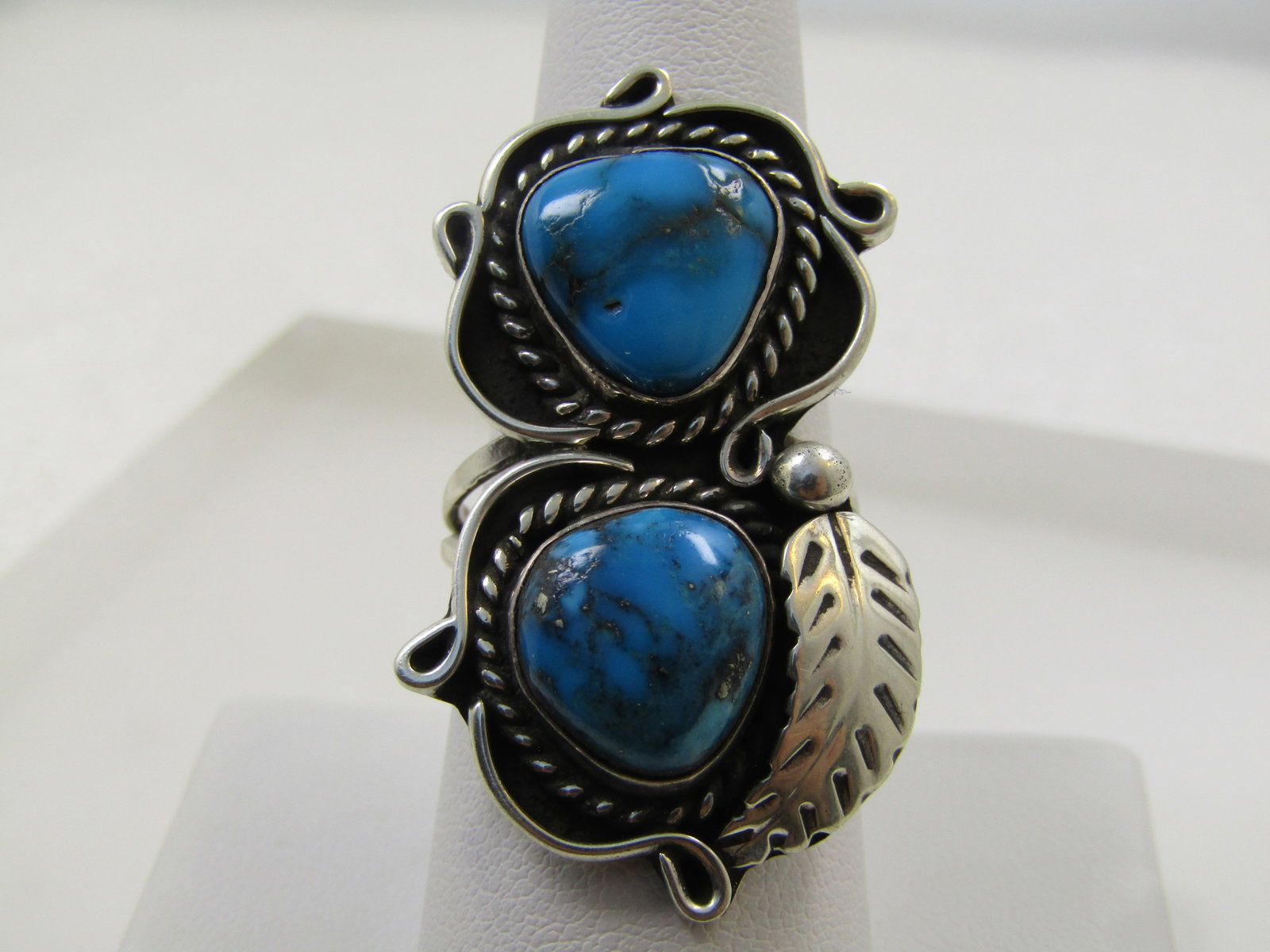 Vintage Sterling Southwestern Turquoise Ring, Sz. 8.5, Unisex, 1980's-1990's: Vintage Sterling Southwestern Turquoise Ring, Unisex, Sz. 8.5, 1980's-1990's. There are two bezel-set turquoise stones in this shadowbox setting. The stones are either turquoise or dyed howlite, They 