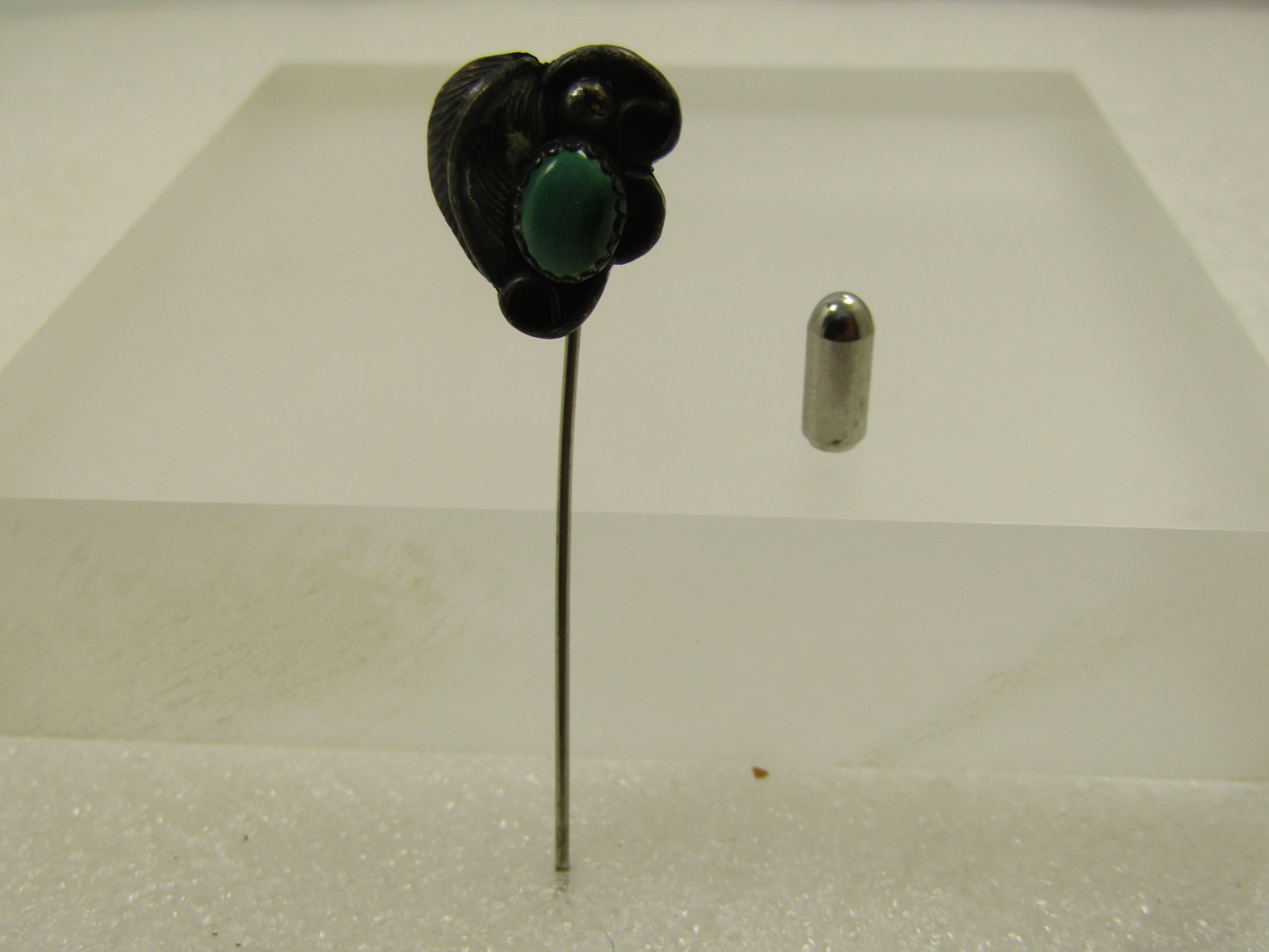 Vintage Sterling Southwestern Malachite Stick Pin, 1960's-1970's: Vintage Sterling Southwestern Malachite Stick Pin, 1960's-1970's. This has a safety cap - the long pin and the cap arenot sterling but the topper is. This has an oval malachite cabochon that is appx. 