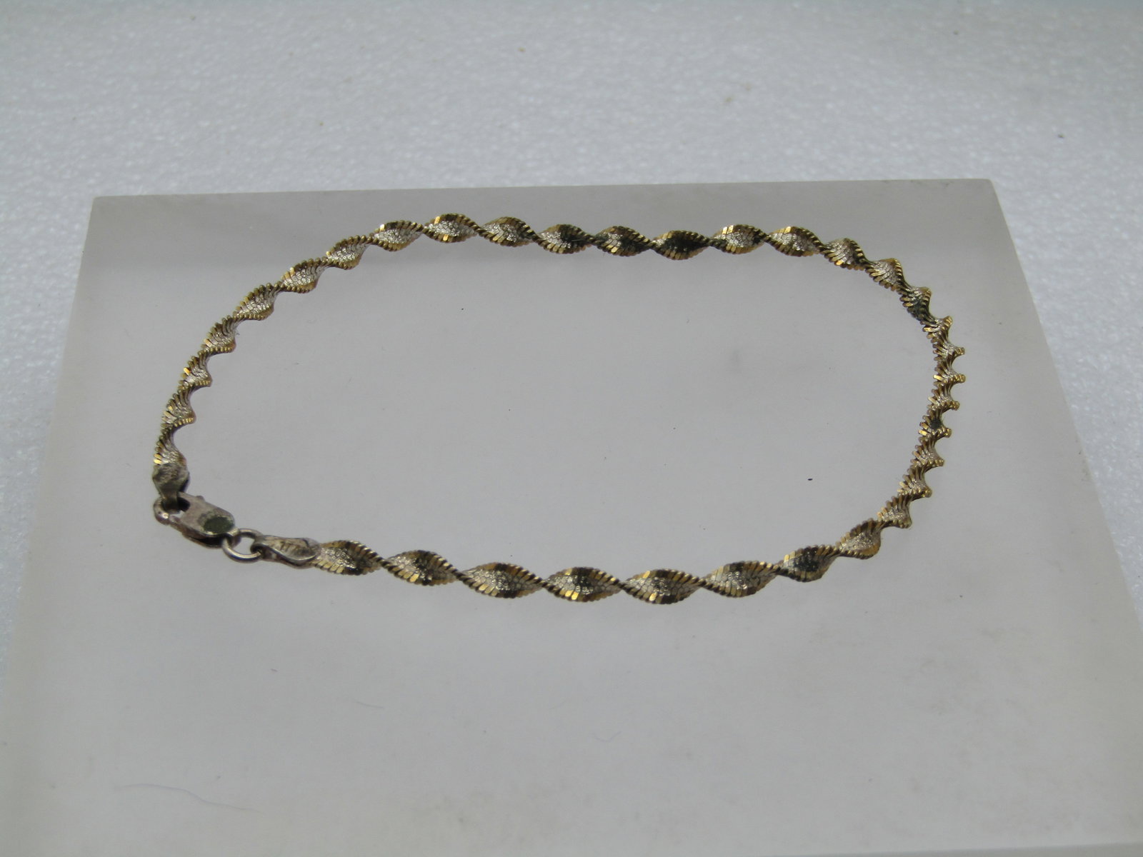 Vintage Twisted Sterling Bracelet/Anklet , Unisex, 9", 1980's: Vintage Twisted Sterling Bracelet/Anklet , Unisex, 9", 1980's. Signed RCI, Italy and marked .925. Tests as sterling with a weight of appx. 3.42 gr. It is3mm wide. Lobster clasp. Light oxidation, good 