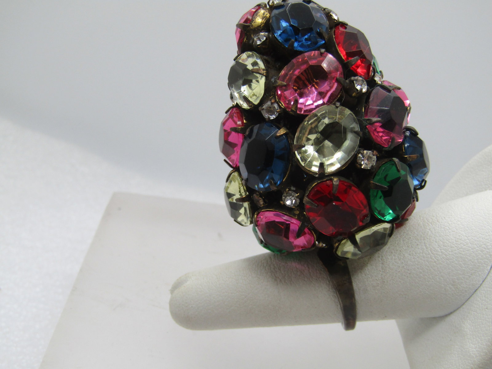 Vintage Uranium Glass and Rhinestone Cluster Ring, Adjustage, Huge Cluster, 1940's: Vintage Uranium Glass and Rhinestone Cluster Ring, Adjustable, Huge Cluster, 1940's. This is almost Christmas tree and egg shaped but more the size of an egg. It is 2" tall from the top of the ring,