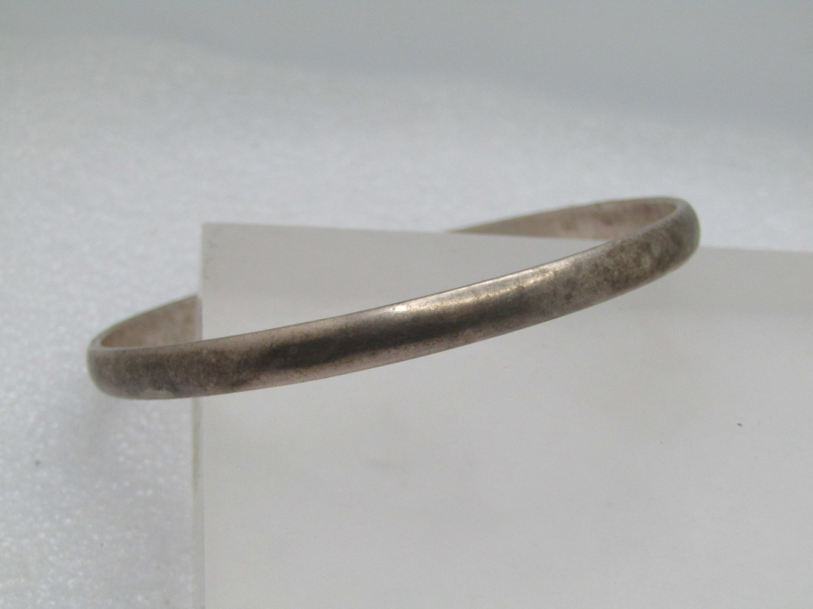 Vintage Silver Bangle Bracelet, 8", Unisex, Signed Taxco, Mexico, 1970's-1980's: Vintage Silver Bangle Bracelet, 8", Unisex, Signed Taxco, Mexico, 1970's-1980's. It is appx. 5mm wide, domed on the outer edge. Opening is circular and appx.. 2.75" across. Great for larger wrists, pl