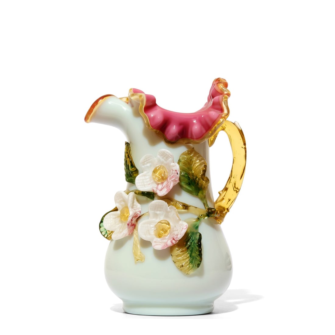 Floral Ewer: Charming ewer, showcasing a colorful body adorned with floral and foliage motifs. Features a rim with a ruffled design in a vibrant cranberry and an amber-colored handle. Disclaimer: This item is