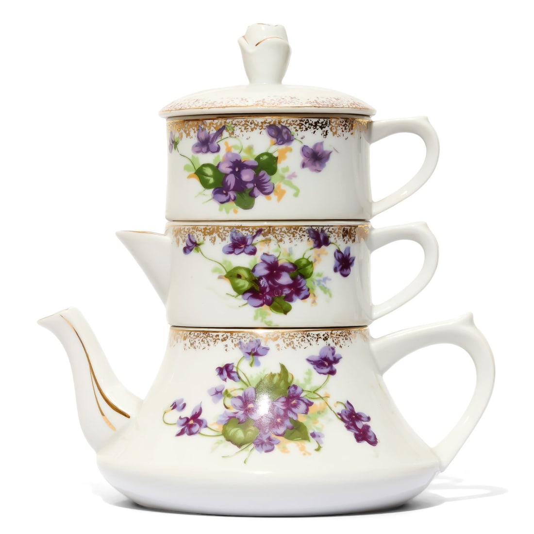 Floral Stacking Teapot and Teacup Set: Stacking teapot and teacup set featuring a delicate floral motif of purple violets and green leaves. Disclaimer: This item is offered for sale as a pre-owned, vintage, antique, estate, or consigned