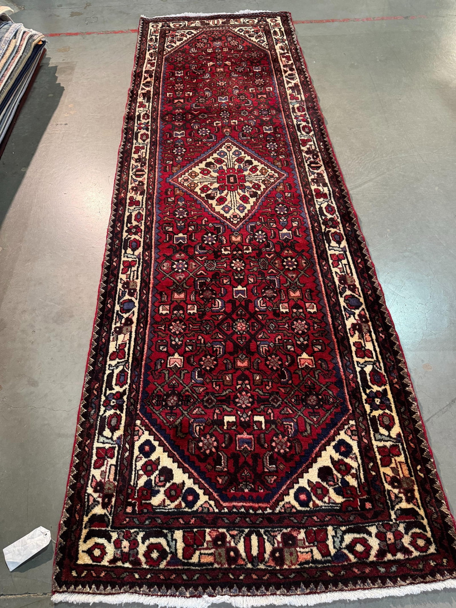 Persian Hamedan Runner 3.4x10: Title:Persian Hamedan Runner 3.4x10 Description:3'.4"x10' Authentic Persian Hamedan Runner, in Red, Navy blue and multi Vegge Dye colors , Hand Knotted in Iran 100% Natural wool pile Reserve: $480.00 