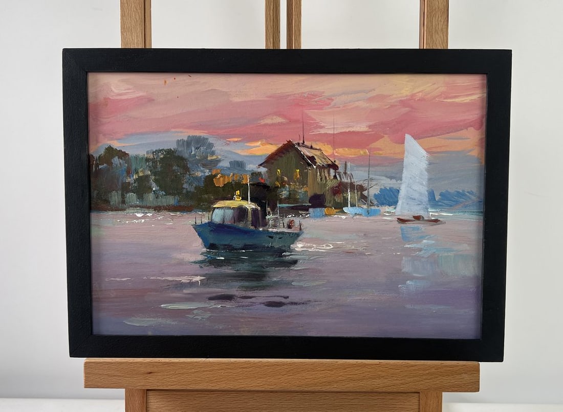Oil painting Boat under the windows of the sea Yuriy Suprunchuk: NoAAA5181The oil painting on Cardboard titled "Boat under the Windows of the Sea" immerses the viewer in a quiet, meditative scene set against the backdrop of a seaside village as dusk descends. The
