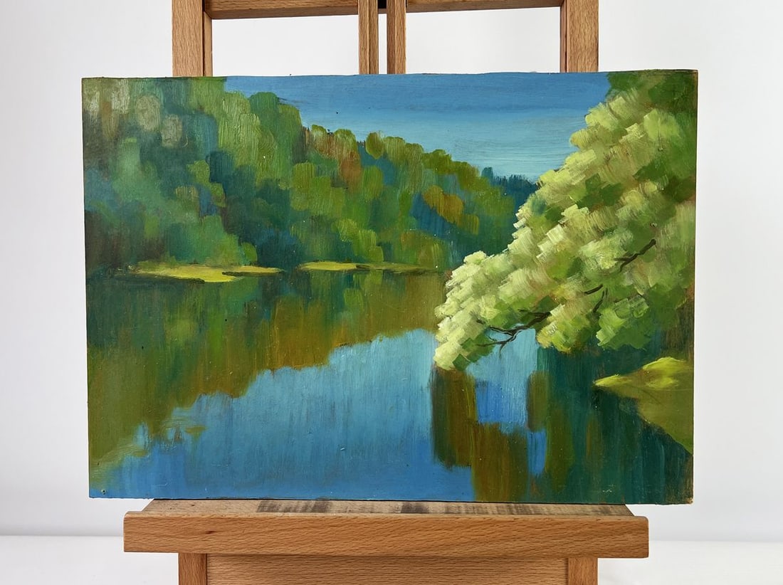 Oil painting Summer green forest Mykhailo Burdylo: NoAAA5041The oil painting on Cardboard titled "Summer Green Forest" captures the serene beauty of a dense, sunlit forest reflected in the calm waters of a quiet lake. The artist has masterfully