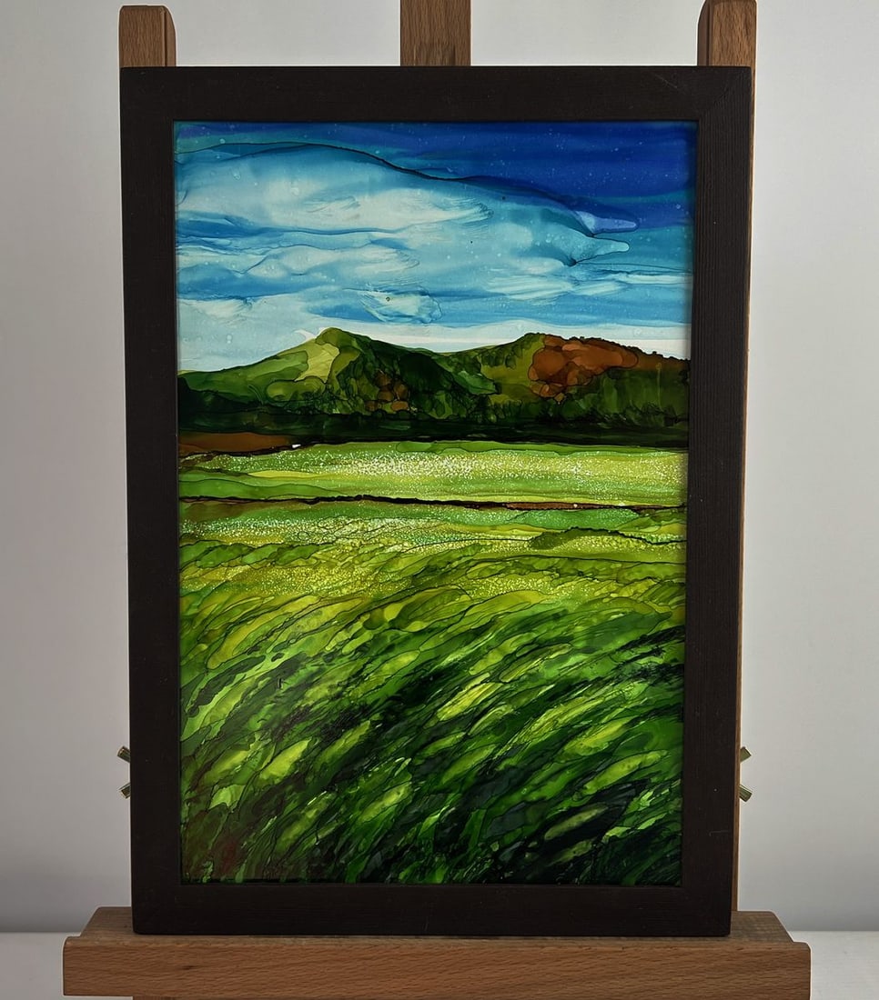 Ink painting Green fields near the mountain Olga Ponomaryova: NoAAA5005The ink painting on hardboard titled "Green fields near the mountain" is a vivid and emotionally resonant depiction of a tranquil rural landscape, where nature is portrayed with both reverenc