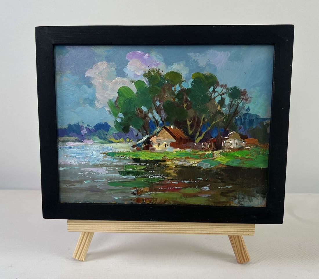 Oil painting The river flows past the village Yuriy Suprunchuk: NoAAA5516The Oil painting on Cardboard titled "The river flows past the village" captures a scene of rustic tranquility, where human life blends seamlessly into the eternal rhythm of nature. It portra