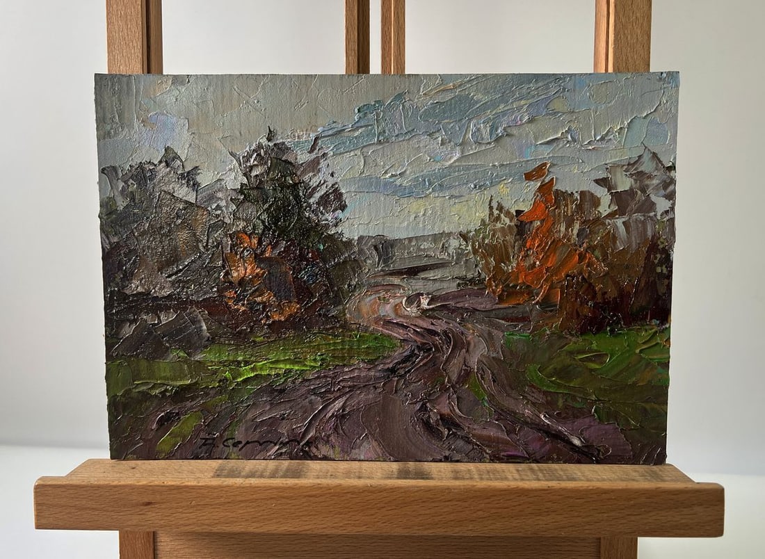 Oil painting Road to the autumn forest Boris Serdyuk: NoAAA5730The Oil painting Cardboard titled "Road to the autumn forest" captures the raw beauty of a rural path winding through a landscape dominated by autumnal tones and expressive brushwork, offerin