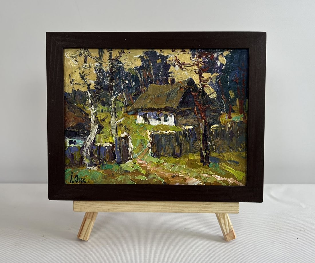 Oil painting Houses near the forest Oksana Ivanyuk: NoAAA4509The painting "Houses Near the Forest" captures a serene yet evocative landscape, where rustic dwellings stand nestled against the towering presence of a dense woodland. The artist's