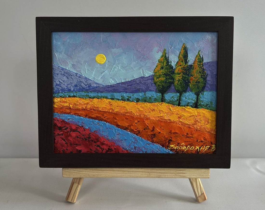 Oil painting Three trees in a field V. Zadorozhnya: NoAAA4572The painting "Three Trees in a Field" is an expressive and vivid oil painting on cardboard, showcasing the beauty of a rural landscape bathed in the soft glow of the setting sun. With its ric