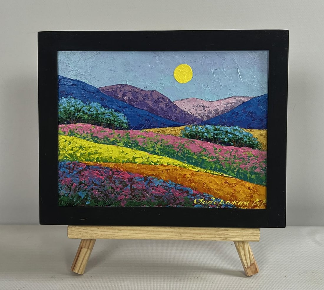 Oil painting Spending time in the mountain fields V. Zadorozhnya: NoAAA4664The oil painting on cardboard titled "Spending Time in the Mountain Fields" is a stunning representation of nature's tranquility, where rolling hills covered in vibrant flowers stretch