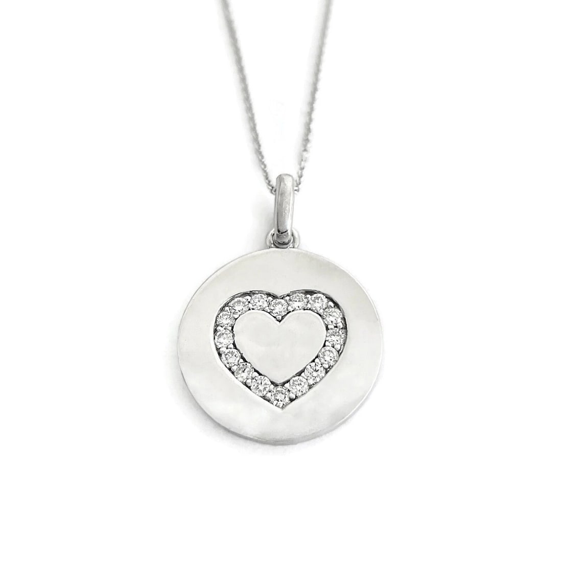 Diamond Heart Round Disc Pendant Necklace 14K White Gold, .64 CTW: Diamond Heart Round Disc Pendant Necklace 14K White Gold, .64 CTW This is a beautiful diamond pendant necklace. Please let us know if you have any questions. Diamonds: 16 round brilliant cuts .64 ctw,