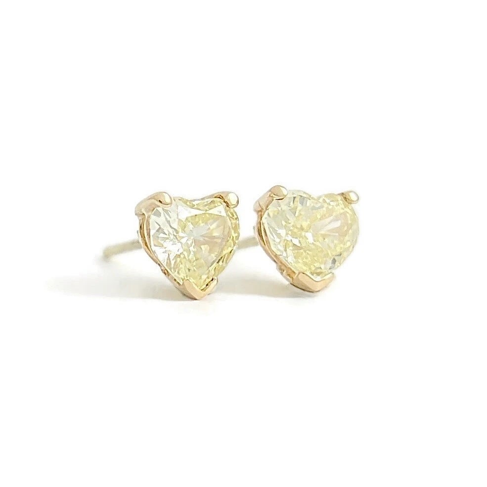 Yellow Diamond Heart Stud Earrings 14K Yellow Gold, 1.43 CTW: Yellow Diamond Heart Stud Earrings 14K Yellow Gold, 1.43 CTW These are gorgeous diamond stud earrings! Please let us know if you have any questions. Diamonds: 2 heart shapes 1.43 ctw, yellow, VS2 Meta