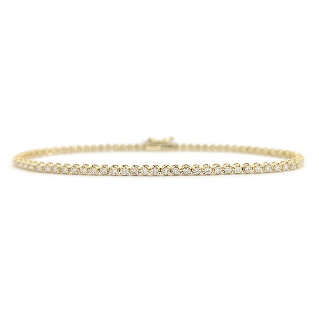 Round Diamond Buttercup-Set Tennis Bracelet 14K Yellow Gold 6.75 Inches 1.05 CTW: Round Diamond Buttercup-Set Tennis Bracelet 14K Yellow Gold 6.75 Inches 1.05 CTW This is a gorgeous bracelet! Please let us know if you have any questions :) Diamonds: 76 round brilliant cuts, 1.05 ct