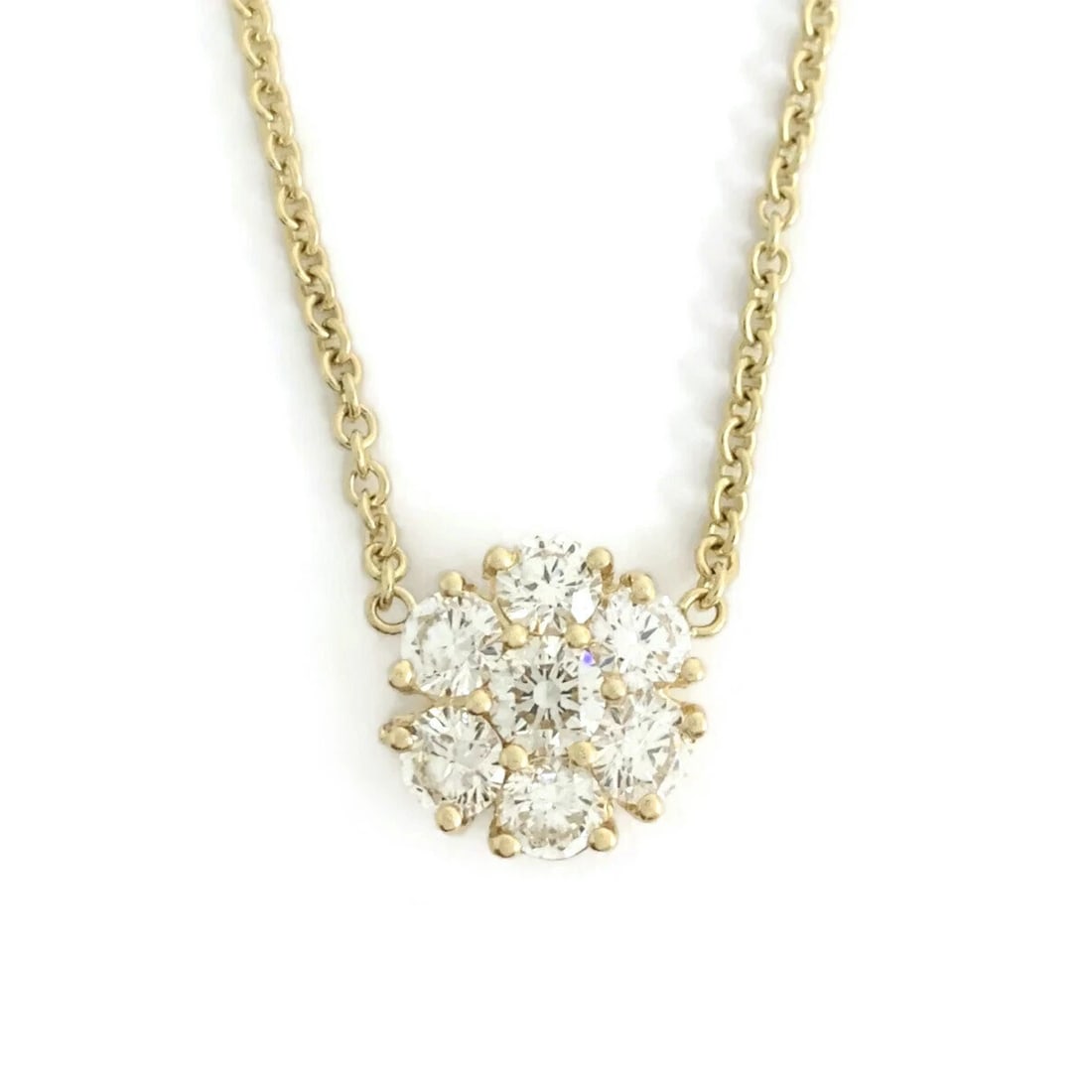 Round Cluster Flower Diamond Pendant Necklace 14K Yellow Gold 1.15 CTW: Round Cluster Flower Diamond Pendant Necklace 14K Yellow Gold 1.15 CTW Make a statement with this beautiful necklace. Please let us know if you have any questions :) Diamonds: 7 round brilliant cuts, 
