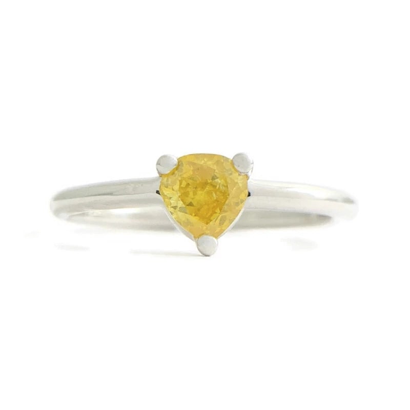 Yellow Diamond Heart Statement Ring 14K White Gold .41 CT: Yellow Diamond Heart Statement Ring 14K White Gold .41 CT This is a lovely ring! Please let us know if you have any questions! Diamonds: 1 heart cut, .41 ct, fancy intense yellow, I1 Metal: 14K white 