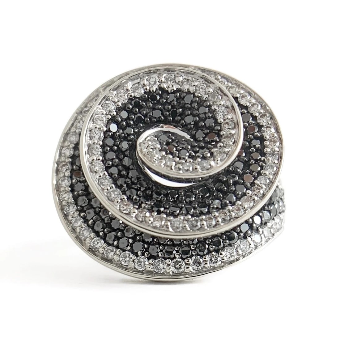 Vintage Black White Diamond Swirl Cocktail Ring 14K White Gold 2.80 CTW 14.05 Gr: Vintage Black White Diamond Swirl Cocktail Ring 14K White Gold 2.80 CTW 14.05 Gr This ring is a beautiful and unique ring! Please let us know if you have any questions. Diamonds: black and white