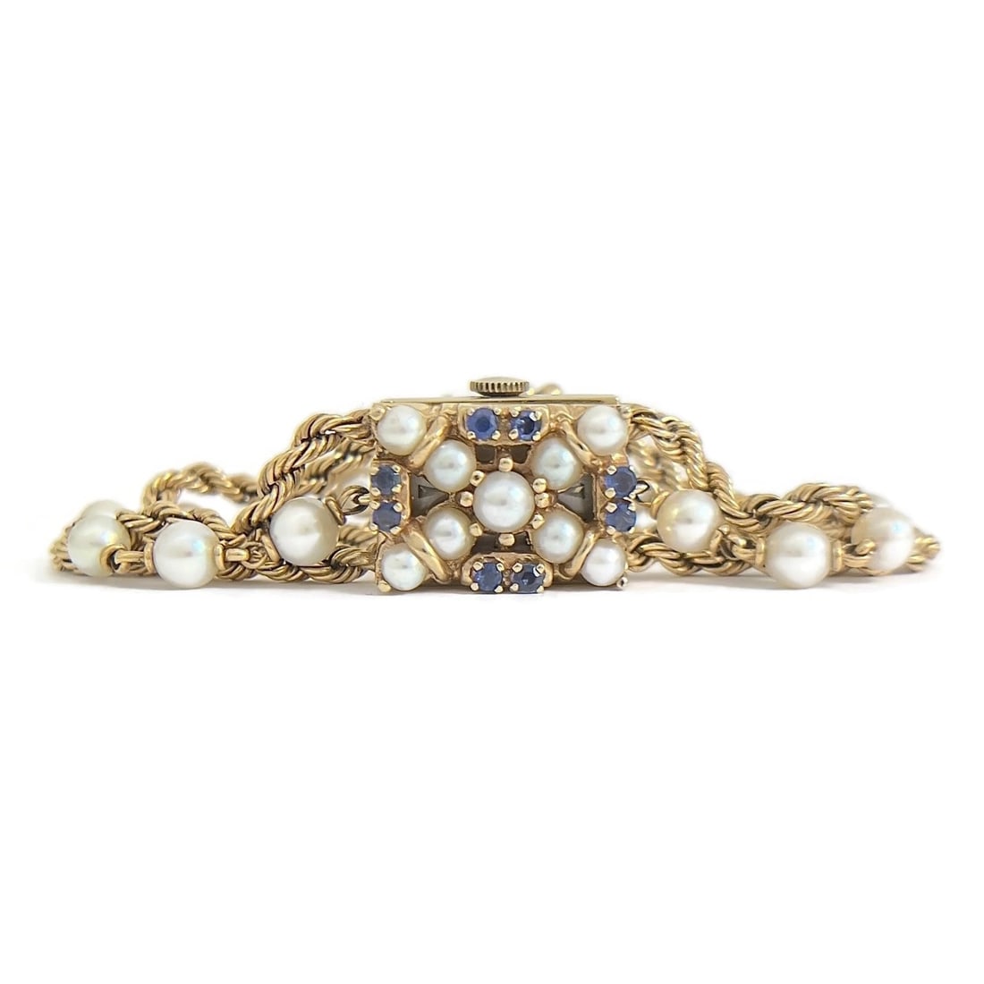 Vintage 1940's Nelmor Pearl Sapphire Bracelet Watch 14K Yellow Gold, 30.7 Grams: Vintage 1940's Nelmor Pearl Sapphire Bracelet Watch 14K Yellow Gold, 30.7 Grams This gorgeous vintage timepiece will add style to any attire. Please let us know if you have any questions. Circa: 1940'