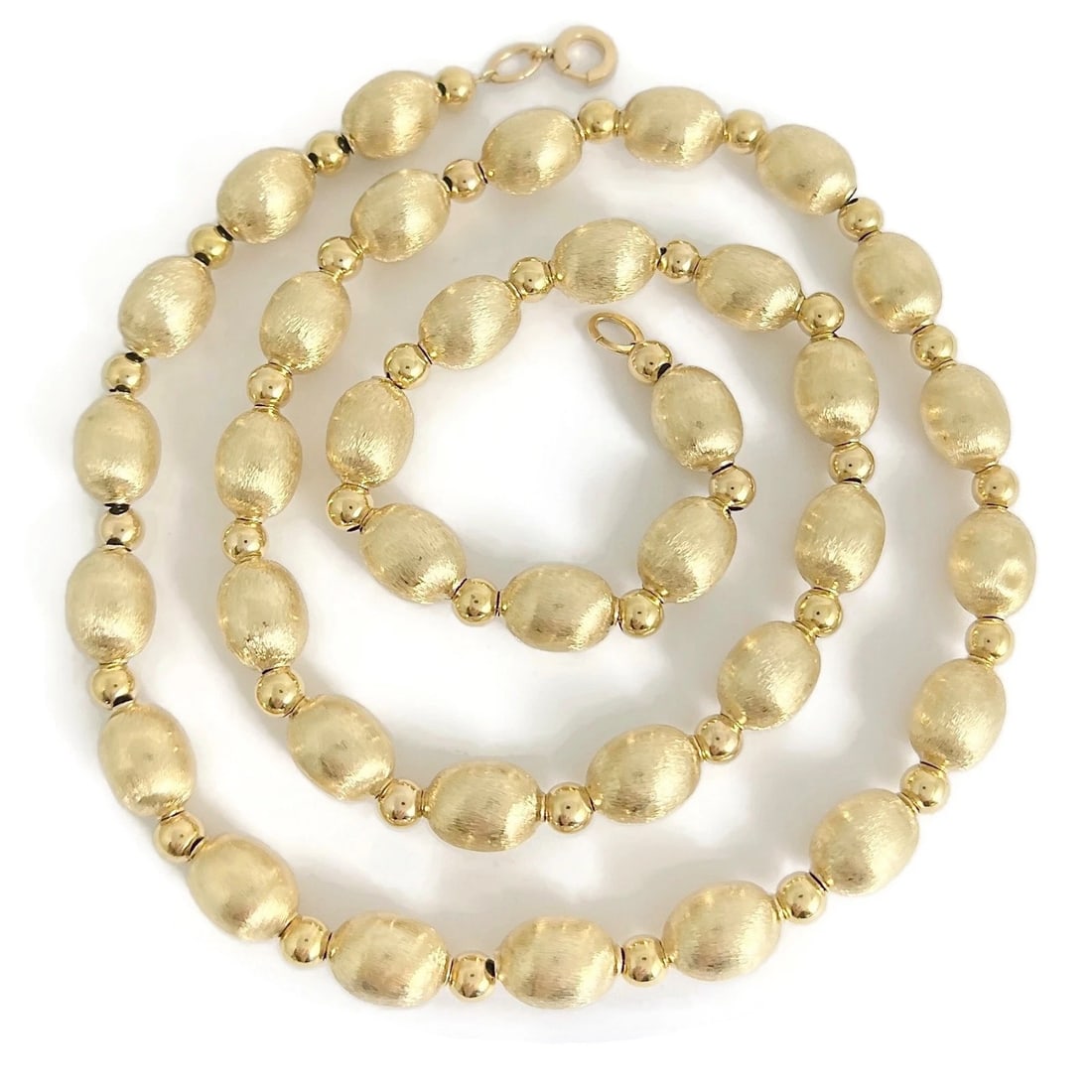 Vintage 1980's Satin Gold Ball Bead Chain Necklace 14K Yellow Gold, 20.65 Grams: Vintage 1980's Satin Gold Ball Bead Chain Necklace 14K Yellow Gold, 20.65 Grams This is a beautiful and unique necklace. Please let us know if you have any questions. Circa: 1980's Metal: tests13K-14K