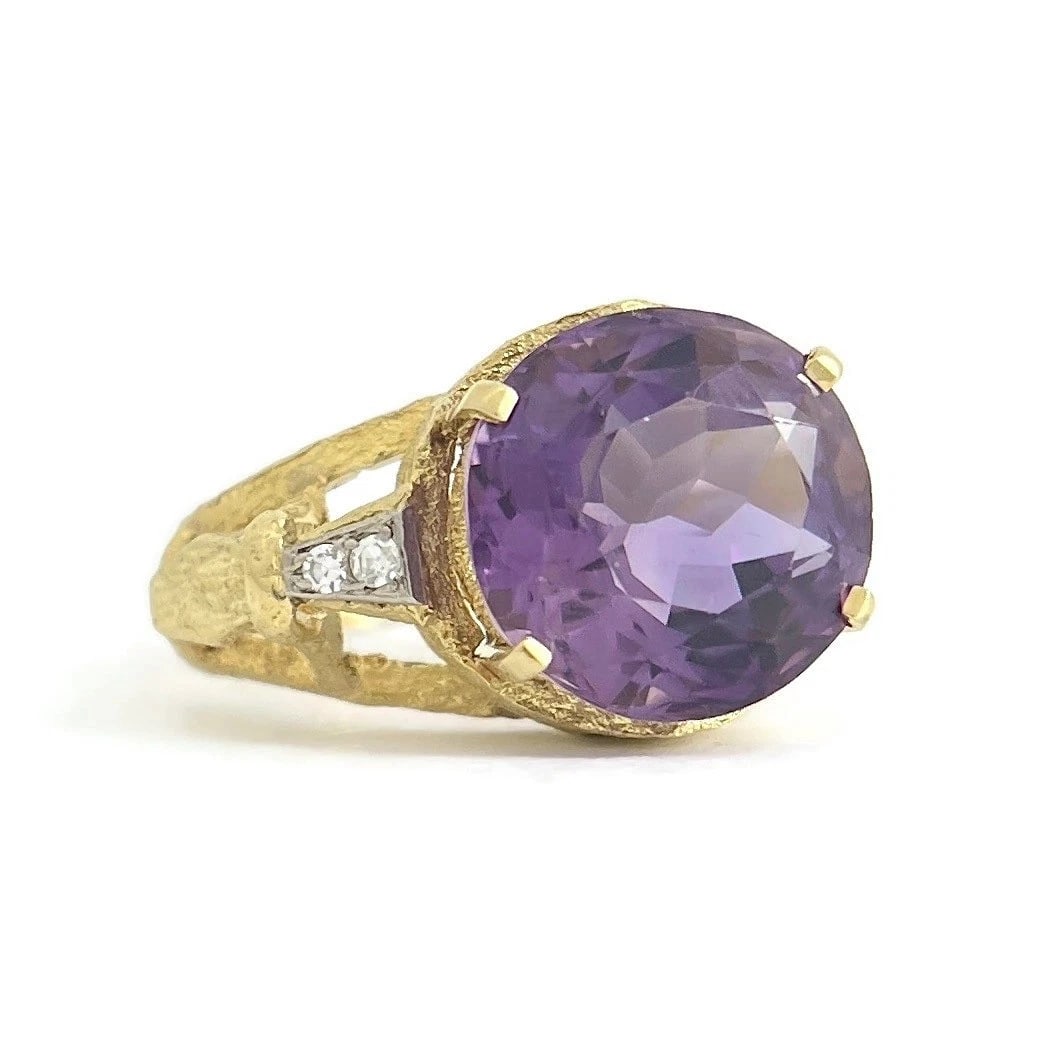 Vintage 1960's Purple Amethyst Diamond Cocktail Ring 18K Yellow Gold, 8.68 Grams: Vintage 1960's Purple Amethyst Diamond Cocktail Ring 18K Yellow Gold, 8.68 Grams This ring is a beautiful statement ring! Please let us know if you have any questions. Circa: 1960's Gemstone: 1 round 
