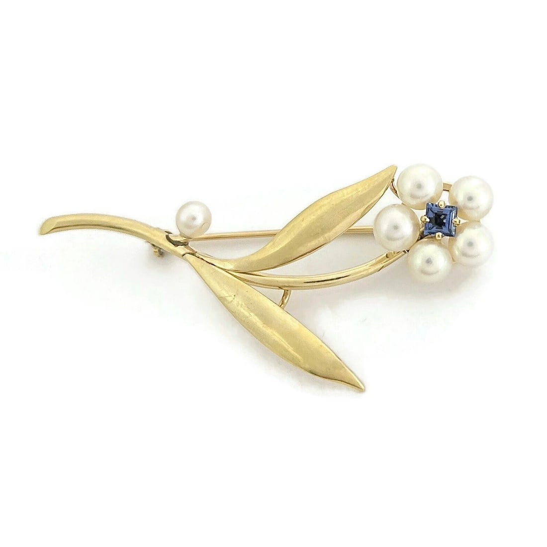 Vintage 1950's Pearl Blue Topaz Flower Brooch Pin 14K Yellow Gold, 4.95 Grams: Vintage 1950's Pearl Blue Topaz Flower Brooch Pin 14K Yellow Gold, 4.95 Grams This is a lovely brooch. Please let us know if you have any questions. Circa: 1950's Pearls: 5 cultured pearls, 5.2 mm; 1 