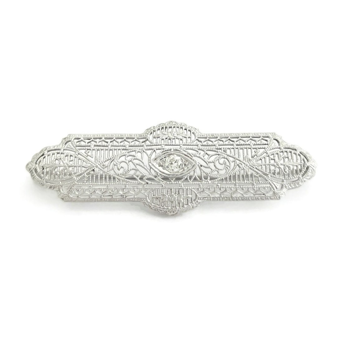 Antique Art Deco Diamond Filigree Long Brooch Pin 14K White Gold, 3.79 Grams: Antique Art Deco Diamond Filigree Long Brooch Pin 14K White Gold, 3.79 Grams This is a gorgeous one-of-a-kind brooch. Please let us know if you have any questions. Circa: 1915-1935, Art Deco Diamonds: