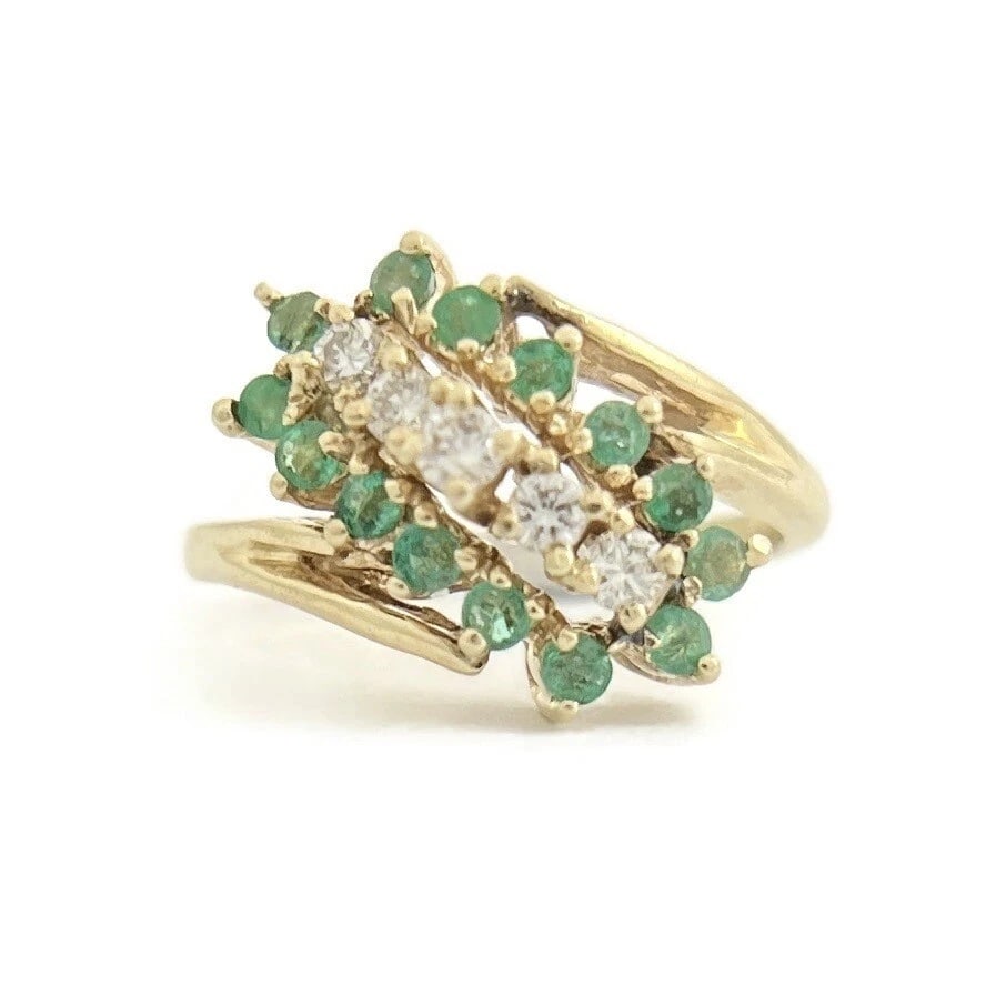 Vintage Green Emerald Diamond Cluster Cocktail Ring 14K Yellow Gold, 3.23 Grams: Vintage Green Emerald Diamond Cluster Cocktail Ring 14K Yellow Gold, 3.23 Grams This is a gorgeous statement ring! Let us know if you have any questions. Gemstones: 14 round green emeralds .22 ctw